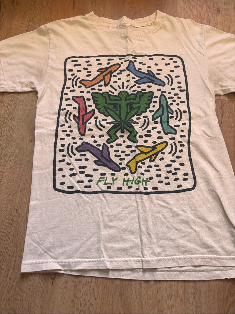Men's White Graphic Tee with Colorful Plane Illustration